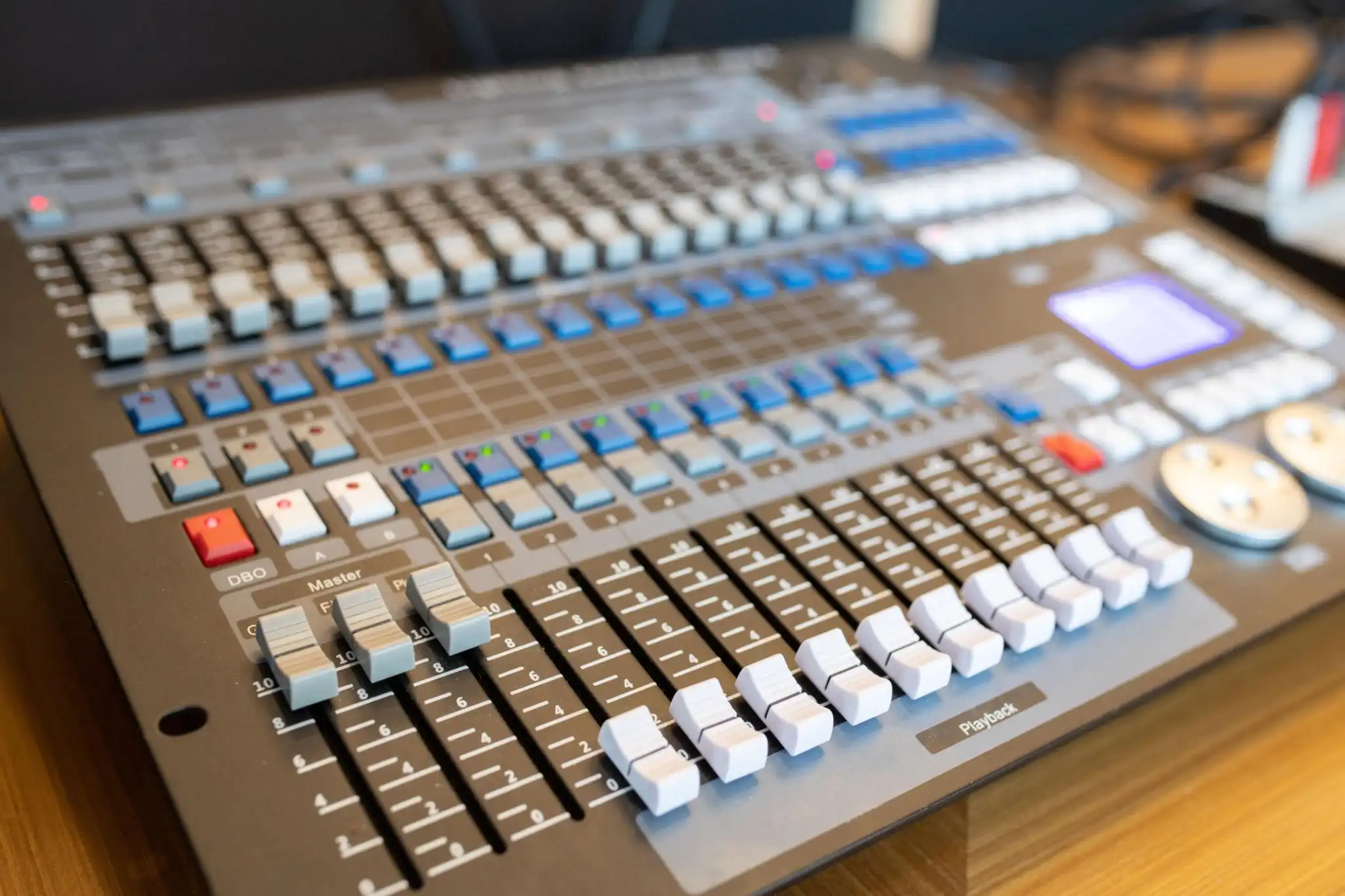 Centralized control room managing stage machinery, lighting, and sound systems for seamless live performance coordination.