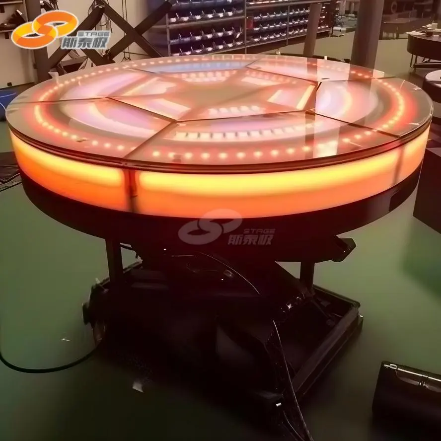 Rotating and lifting stage platform combining hydraulic technology for advanced theatrical performances. Rotating and lifting stage platform combining hydraulic technology for advanced theatrical performances.