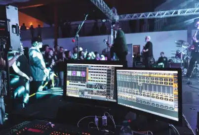 A rotating stage is used when there is a big scene change in a Broadway musical or when a fancy car comes out from under the stage floor at an auto show. This complex electromechanical system lifts things up and down and turns them horizontally. This makes visual experiences that are more dynamic than those possible with rigid platforms. Precision motors, reducers, slewing ring bearings, and hydraulic or scissor lift mechanisms are what make up a rotating stage. They move scenery, actors, or goods safely and smoothly during live events.  What Is a Rotating Stage and How Does It Work in Live Shows? A rotating stage, sometimes called a revolving stage or turntable platform, is a circular platform that is built to rotate and is attached to a center pivot point. These days, systems combine motorized drives with lifting devices so they can do both horizontal rotation and vertical elevation at the same time or separately. This two-in-one feature changes how people enjoy live performances.  Core Mechanical Components The foundation of any professional rotating stage consists of several interconnected systems working in harmony. A motor paired with a reducer provides the torque needed to rotate heavy loads smoothly. Linear guides and scissor support frames ensure stability during vertical movement, while slewing ring bearings handle the rotational forces. The control system coordinates these elements, allowing operators to adjust speed from 0.2 to 3.0 RPM and positioning with precision within ±2mm accuracy.  Power and Control Systems Variable Frequency Drives regulate motor speed, enabling soft starts and stops that protect delicate scenery and performers. Conductive slip rings maintain continuous electrical connections to the rotating platform, powering lighting, audio equipment, and special effects without tangled cables. Advanced systems support DMX512 protocols, integrating seamlessly with venue lighting and automation infrastructure for synchronized performances.  Weight Distribution and Safety Load-bearing capacity remains critical in professional applications. High-tensile steel construction distributes weight evenly across the platform, preventing deformation under eccentric loads. Anti-vibration mounts reduce operational noise below 50dB—essential for opera houses and recording environments. Emergency systems include anti-drop valves, obstacle detection sensors, mechanical locks for maintenance, and emergency stop controls accessible from multiple operator positions.  Types of Rotating Stages Used in Live Shows and Their Applications Different performance contexts demand specific rotating stage configurations. Understanding these variations helps procurement teams match equipment capabilities to venue requirements and production goals.  Motorized Turntable Platforms Fully automated systems dominate professional theater installations. These platforms feature programmable rotation speeds, position memory functions, and integration with show control systems. Their reliability makes them ideal for productions requiring split-second timing and repeatable movements night after night. Theaters running repertory schedules particularly benefit from their ability to store multiple scene configurations.  Combined Lift-and-Rotate Systems When vertical dimension adds dramatic impact, combined systems deliver exceptional versatility. Our Rotating Stage Lift Platform integrates scissor lift technology with turntable mechanisms, supporting loads from 3 to 4 tons while elevating from 0.5 to 5 meters. The compact design minimizes pit depth requirements—a crucial advantage when retrofitting historic venues with limited structural modification options.  These dual-function platforms excel in automotive product launches, where vehicles rise from below stage level while rotating for 360-degree visibility. Theme parks use them to create disappearing acts and magical transformations. Convention centers appreciate their flexibility for reconfiguring spaces between corporate presentations and evening galas.  Concentric Multi-Axis Configurations Large-scale productions sometimes employ nested rotating platforms—smaller turntables mounted on larger ones. This configuration enables complex choreography, with performers moving in opposite rotational directions simultaneously. While mechanically sophisticated, these systems require expert engineering to maintain balance and synchronization across multiple drive systems.  Benefits of Using Rotating Stages in Live Shows Investment in rotating stage technology delivers measurable advantages across operational, creative, and financial dimensions. These benefits compound over the equipment's service life, typically spanning thousands of performance cycles.  Enhanced Visual Storytelling Rotation gets rid of the sightline problems that come with proscenium stage. Viewers see shows from a variety of angles, which keeps things visually interesting throughout performances. Scene changes happen naturally, without drawing the shades or turning down the lights, which keeps the story moving forward. Through spatial choreography, directors can tell strong symbolic stories about how characters move through time, how points of view change, and how relationships change over time.  Operational Efficiency Gains Scene changes that are done by hand require large backstage teams, longer breaks, and the risk of hurting someone when moving heavy set pieces. Changeover times drop from minutes to seconds on automated systems. Twelve stagehands would normally be needed to do the work that one operator does. This efficiency directly leads to lower labor costs and more schedule options for places that host many events every day.  This is shown by Sh Stage's revolving stage displays at the Yanji Dinosaur Kingdom. The theater has three main lifting platforms and five sub-stages that allow for quick scene changes during high-frequency theme park performances. This keeps show plans that get as many people as possible through the doors during busy times.  Safety and Reliability When moving heavy things, precision control systems get rid of the chance of human mistake. Accidents during work can be avoided with automated obstacle detection. Mechanical safeguards make sure that shows can go on even if the main systems break down. Prior to leaving the plant, equipment is put through strict testing procedures that include 125% overload tests and non-destructive weld inspections to make sure that the structure is sound.  Over the course of 24 hours, our hydraulic systems keep their positional accuracy within 2 mm, making sure that they always work the same way, even if the temperature changes. This dependability is very important for touring shows that can't have mechanical problems in different settings every week.  How to Select and Procure the Right Rotating Stage for Your Live Show Needs Procurement decisions impact production capabilities for decades. A systematic evaluation process aligns technical specifications with operational requirements and budget constraints.  Critical Specification Parameters Load capacity calculations must account for peak loads plus safety margins—typically 1.5x the heaviest anticipated configuration. Consider not just scenery weight but performers, props, and embedded technical equipment. Rotation speed requirements vary by application: slow, stately movement for dramatic reveals versus rapid rotation for comedy or spectacle.  Physical dimensions determine integration feasibility. Measure available floor space, structural load ratings, and pit depth if installing below-stage systems. Our compact designs maximize platform size while minimizing support structure footprint—particularly valuable in venues with limited wing space or historic buildings with protected structures.  Evaluating Manufacturers and Suppliers Well-known companies that make rotating stages show how good they are by showing off their finished projects and engineering qualifications. Since our start in 2009, Sh Stage has helped theaters, convention centers, and cultural venues on five countries with their stage equipment needs. Jiangsu Zhongbang Intelligent Technology Co., Ltd., our parent company that makes our products, keeps its ISO and CE licenses, which makes sure that quality standards are always met.  Look over case studies that fit the needs of your project. Fireproof curtains, lighting hoists, orchestra lifts, and double-deck platforms are just a few of the things that can be integrated into the Shenzhen XX World Theater installation. It's a complete turnkey solution. This track record shows that you have the system engineering skills needed for building complicated cultural infrastructure.  Understanding Total Cost of Ownership The purchase price of revolving stage equipment is only one part of the total costs over the life of the product. If you want to know how to fix something, how often it needs to be maintained, and if spare parts are available, you should think about all of these things. Reliable suppliers make repair schedules easy to understand and keep important parts on hand so they can be quickly replaced if needed.  Delivery dates affect how projects are planned. Standard configurations usually ship between 15 and 30 days, while custom-engineered options take between 30 and 45 days. When you buy something internationally, you have to wait longer for shipping and customs clearing. Working with foreign trade teams that are experienced makes logistics easier. Our multilingual support staff handles paperwork, freight forwarding, and customs compliance so that overseas delivery goes smoothly.  Installation, Maintenance, and Optimization Tips for Rotating Stages in Live Shows Proper implementation extends equipment service life and ensures reliable performance under demanding production schedules. Following manufacturer guidelines prevents common issues that compromise safety and functionality.  Professional Installation Requirements Rotating stages demand precision installation to achieve specified performance parameters. Foundation preparation ensures level mounting surfaces that prevent uneven wear on drive components. Structural anchoring must meet local seismic and safety codes—particularly critical for platforms supporting performers.  During commissioning, technicians calibrate sensors, verify safety interlocks, and test emergency systems under load conditions. Our installation teams work alongside venue technical staff, providing hands-on training that transfers operational knowledge. This collaborative approach ensures smooth transitions from construction to live operation.  Preventive Maintenance Protocols Regular checks find problems as they start to happen before they become major problems. Every month, you should check the electrical links, hydraulic fluid levels, and bearing lubrication. As part of the three-month maintenance, the balance of the drive system is checked, and the control software is updated. Factory-certified technicians do full checks once a year to make sure that safety standards are being met and to find parts that are getting close to the end of their useful life.  Proper lubrication greatly increases the life of mechanical parts. Slewing ring bearings need specific kinds of grease and to be used at certain times. Instead of using general industrial oils, check with the manufacturer's instructions. Linear guides work better in clean surroundings; regular cleaning keeps abrasive particles from building up and speeding up wear.  Operational Optimization Strategies How the load is distributed changes the shapes of mechanical stress and wear. When you can, put heavy parts of the scenery in the middle of the scene to reduce uneven loading. When asymmetric configurations are necessary, counterweights or ballast bring things back into balance and lower the stress on the drive system.  Speed programming makes things safer and more beautiful. Gradual acceleration and deceleration curves keep the scenery and artists from moving in ways that could be unstable. During practice, make sure that timing sequences are perfect so that stage movement, sound effects, lighting cues, and performance choreography all work together smoothly.  Conclusion The use of revolving stages is an example of advanced tech that greatly increases the creative options in live performance settings. These platforms allow scene changes, product presentations, and audience participation tactics that aren't possible with static staging because they combine the ability to lift vertically with precise rotational control. When you do professional procurement, you have to carefully look at things like load requirements, venue restrictions, manufacturer knowledge, and lifecycle support capabilities. Rotating stage systems provide decades of dependable service when they are properly specified, installed, and kept. They become permanent production assets that improve every performance while upholding the highest safety standards for both performers and audiences.  FAQ What load capacity do I need for theater productions? Standard theatrical applications typically require 3-4 ton capacity for scenery, performers, and embedded equipment. Calculate your heaviest scene configuration, add performer weight, then apply a 1.5x safety factor. Automotive showcases need higher capacities—luxury vehicles weigh 2-3 tons alone. Always consult structural engineers when loads exceed 5 tons to verify venue floor ratings and foundation adequacy.  Can rotating stages operate silently during performances? Modern systems achieve noise levels below 50dB through precision bearings, vibration isolation mounts, and VFD-controlled motors. This quiet operation suits opera houses and acoustic performances where mechanical noise would disrupt the audience experience. Specify low-noise requirements during procurement—standard industrial configurations may produce acceptable but audible operational sounds.  What customization options are available? Manufacturers offer extensive customization including platform diameter, lift height, rotation speed ranges, surface finishes, and embedded technical infrastructure. You can integrate trap doors, hydraulic performer lifts, and cable management systems. Control interfaces adapt to existing venue automation or operate as standalone systems. Custom engineering extends lead times but ensures perfect alignment with your specific production requirements and venue constraints.  Partner with Sh Stage for World-Class Rotating Stage Solutions Sh Stage has specialized in stage automation and rotating stage systems since 2009. As a direct manufacturer with strong R&D and production capabilities, we deliver integrated solutions covering design, manufacturing, installation, and commissioning with strict quality control and international standards compliance.  Our core products include rotating stages, lifting platforms, and customized stage machinery for theaters, concert halls, and entertainment venues. Each system is precision-engineered and tested to ensure safe, stable, and reliable performance.  We have completed projects across global venues, including Suzhou High-speed Railway New Town Athletic Hall and Yanji Dinosaur Kingdom theaters, demonstrating proven engineering capability in real applications.  We provide full turnkey services from design consultation and customization to installation, training, and long-term technical support.  Contact us for project inquiries and cooperation:  Website: www.shstage.com / www.jszbzn.com  Email: info@shstage.com  Tel / WhatsApp: +86 18068792502  As an experienced overstage machinery manufacturer, Sh Stage delivers the technical expertise, dependable quality, and responsive support your venue deserves.  References 1. Baugh, C. (2013). Theatre, Performance and Technology: The Development of Scenography in the Twentieth Century. Palgrave Macmillan.  2. Sammler, H. & Bicât, T. (2019). The Stage Management Handbook. Crowood Press.  3. Ionazzi, D. A. (1996). The Stage Management Handbook: A Complete Guide to Understanding the Stage. Betterway Books.  4. Reid, F. (2001). Designing for the Theatre: A Complete Course in Stage Design. Routledge.  5. Holloway, J. (2014). Illustrated Theatre Production Guide. Routledge.  6. Carter, P. (2009). Backstage Handbook: An Illustrated Almanac of Technical Information. Broadway Press.